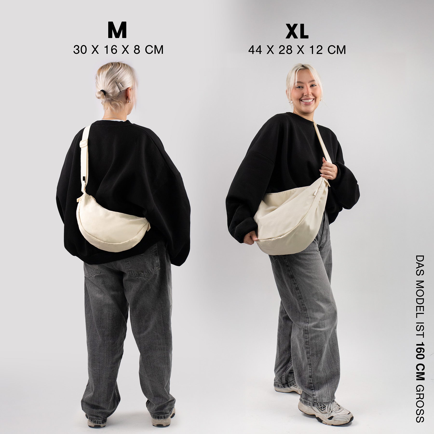 Moon bag beige XL indoor frau steht mit dem ruecken zur kamera traegt weite jeans